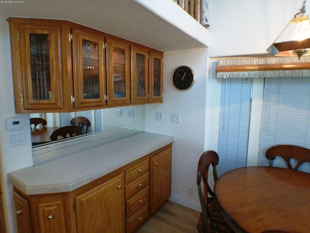 84136 Ave 44, Unit 582 Indio, CA 92203 - Photo 19 of 56 a kitchen with a table and a chair