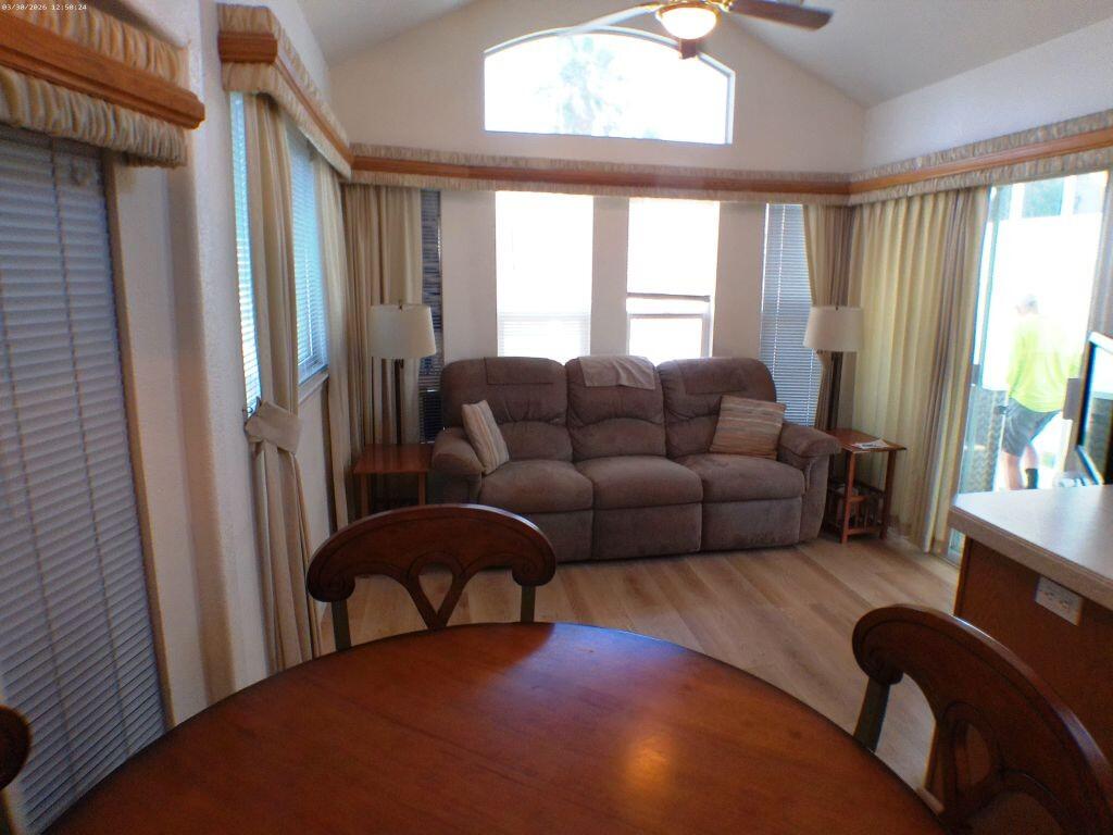 84136 Ave 44, Unit 582 Indio, CA 92203 - Photo 24 of 56 a living room with furniture and a large window