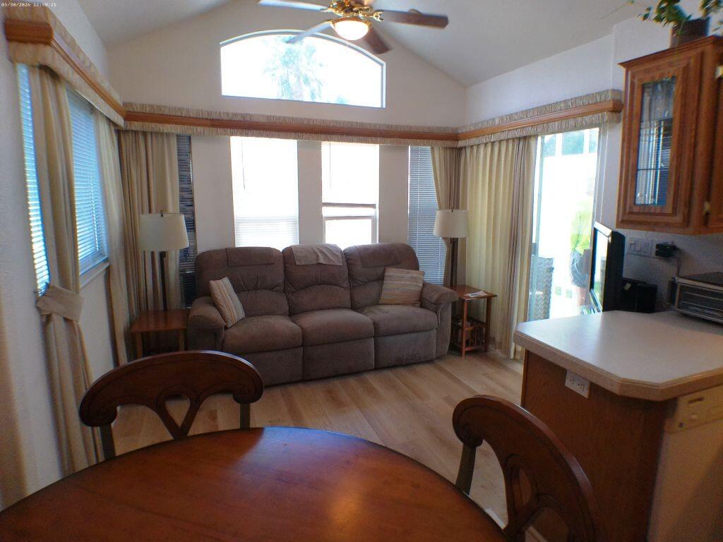 84136 Ave 44, Unit 582 Indio, CA 92203 - Photo 26 of 56 a living room with furniture and a window