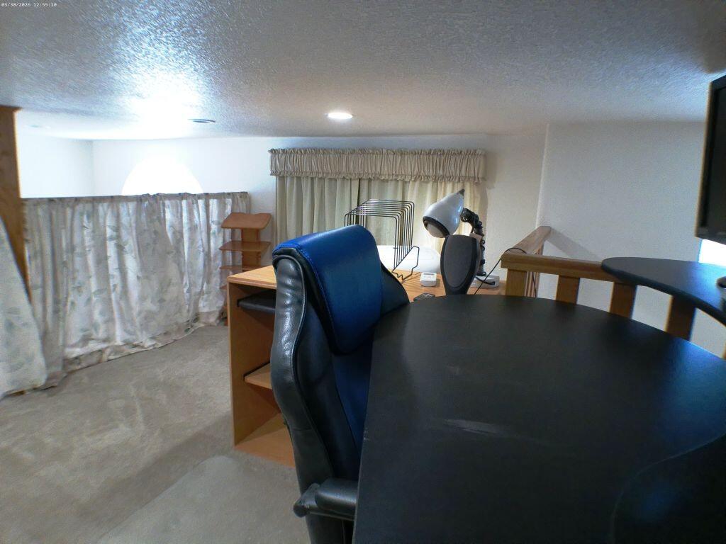 84136 Ave 44, Unit 582 Indio, CA 92203 - Photo 45 of 56 a view of a balcony with chairs