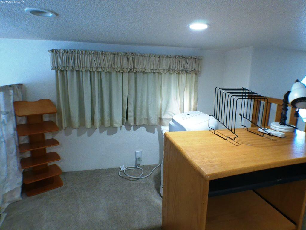 84136 Ave 44, Unit 582 Indio, CA 92203 - Photo 48 of 56 a room with pool table and windows