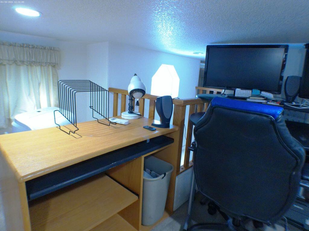 84136 Ave 44, Unit 582 Indio, CA 92203 - Photo 49 of 56 a room with chairs and tables