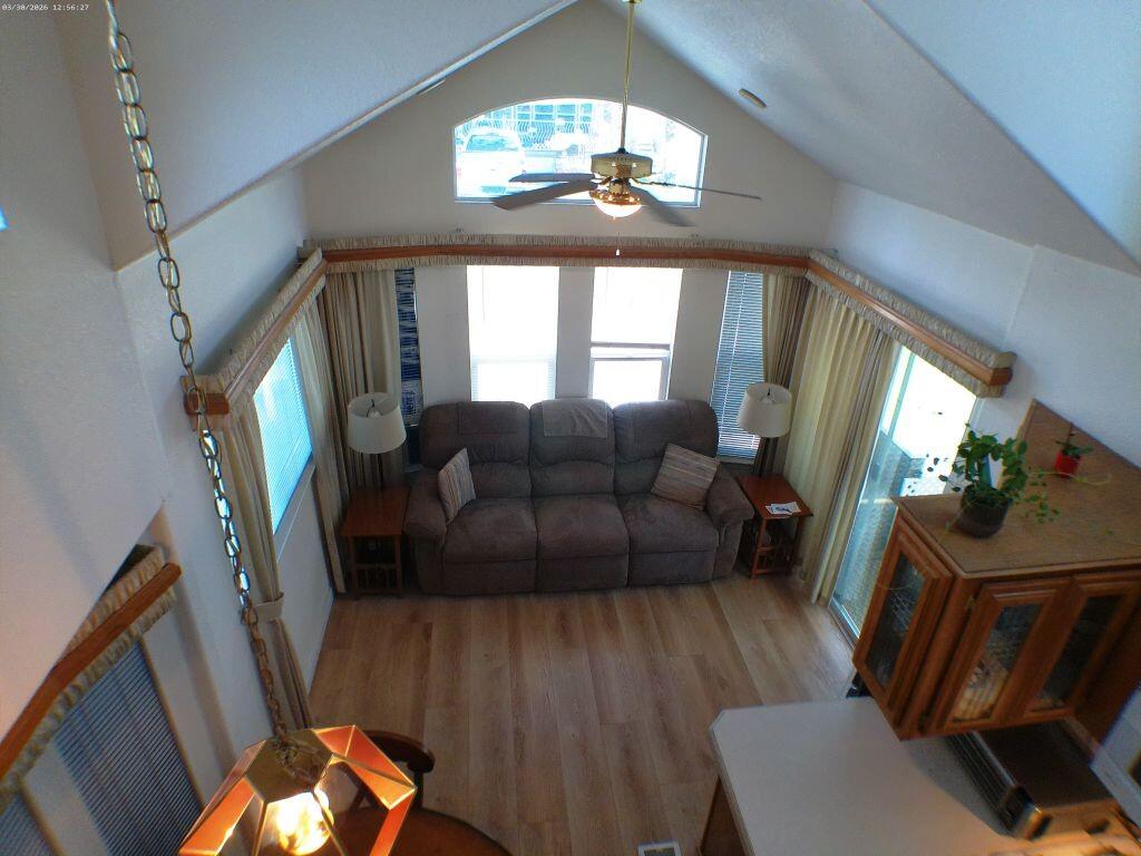 84136 Ave 44, Unit 582 Indio, CA 92203 - Photo 51 of 56 a living room with furniture and a large window