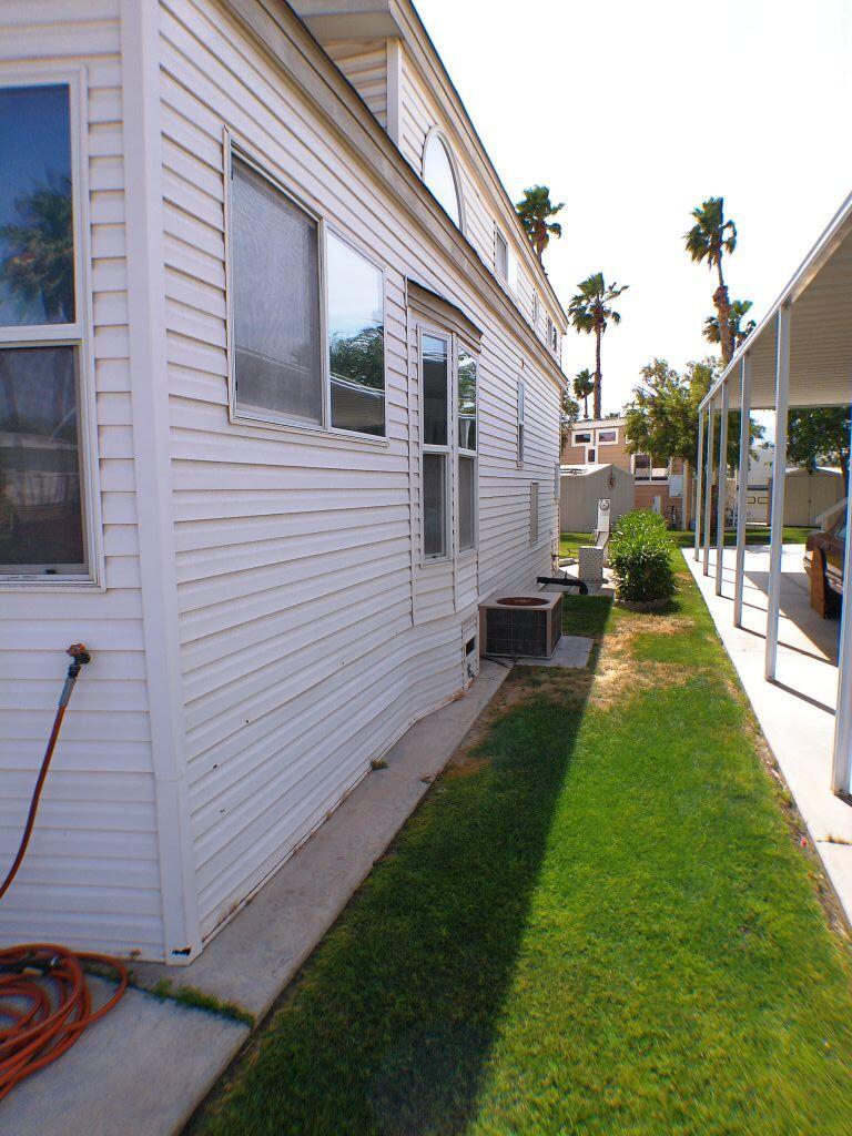 84136 Ave 44, Unit 582 Indio, CA 92203 - Photo 9 of 56 a view of a backyard with sitting area