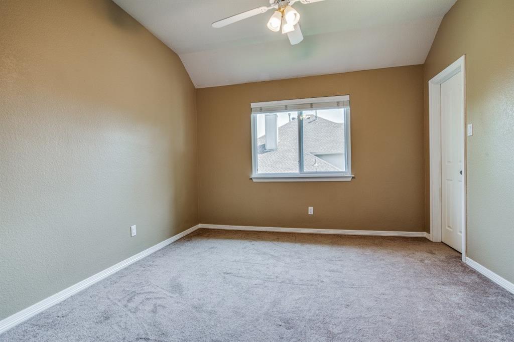 3814 Ridgecrest Avenue Rowlett, TX 75088 - Photo 17 of 24 an empty room with windows
