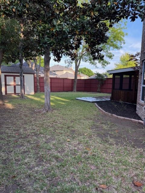 3814 Ridgecrest Avenue Rowlett, TX 75088 - Photo 23 of 24 a view of a backyard