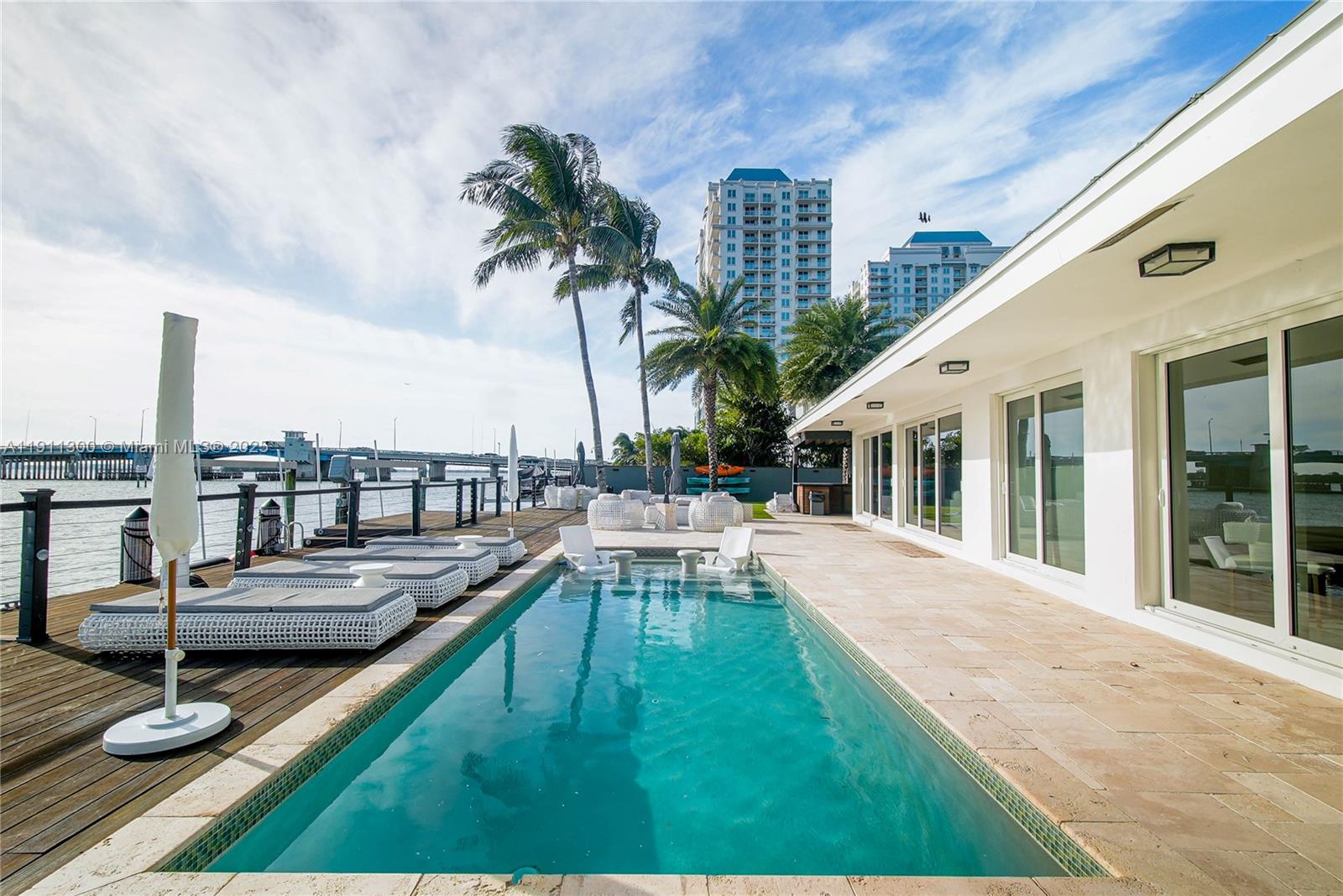 1242 Northeast 81st Terrace Miami, FL 33138 - Photo 12 of 23 a view of a patio with swimming pool