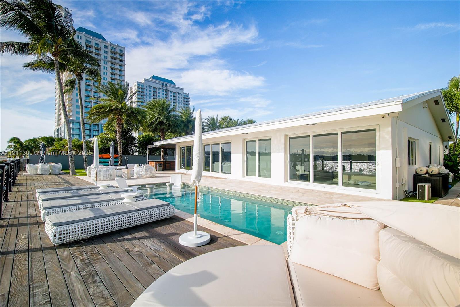 1242 Northeast 81st Terrace Miami, FL 33138 - Photo 13 of 23 a view of house with a swimming pool