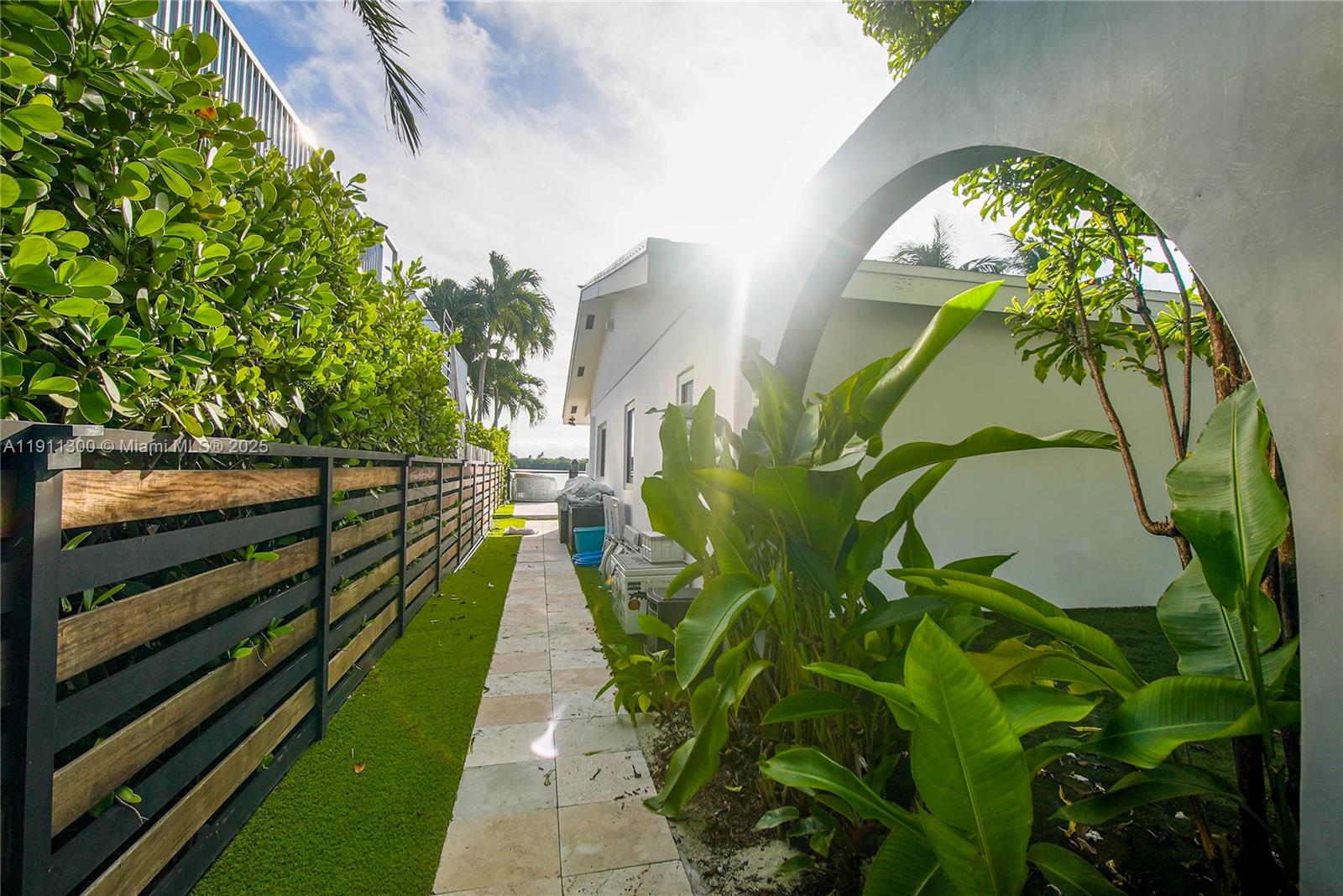 1242 Northeast 81st Terrace Miami, FL 33138 - Photo 22 of 23 a view of outdoor space with garden