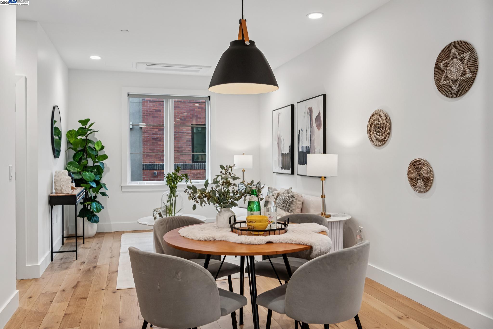 922 Brown Avenue Lafayette, CA 94549 - Photo 15 of 45 a view of a dining room with furniture and wooden floor