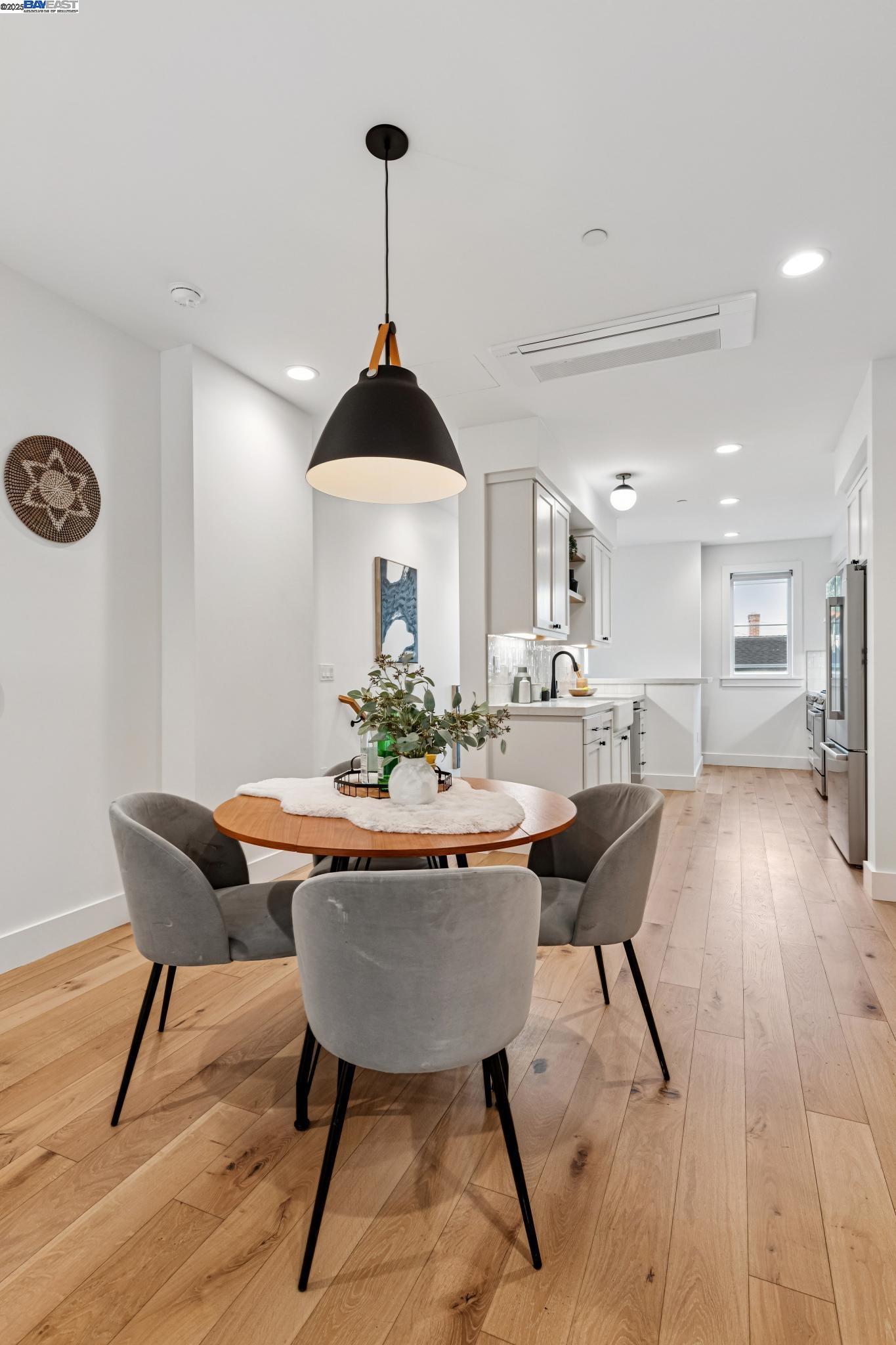 922 Brown Avenue Lafayette, CA 94549 - Photo 16 of 45 a dining room with furniture a chandelier and wooden floor