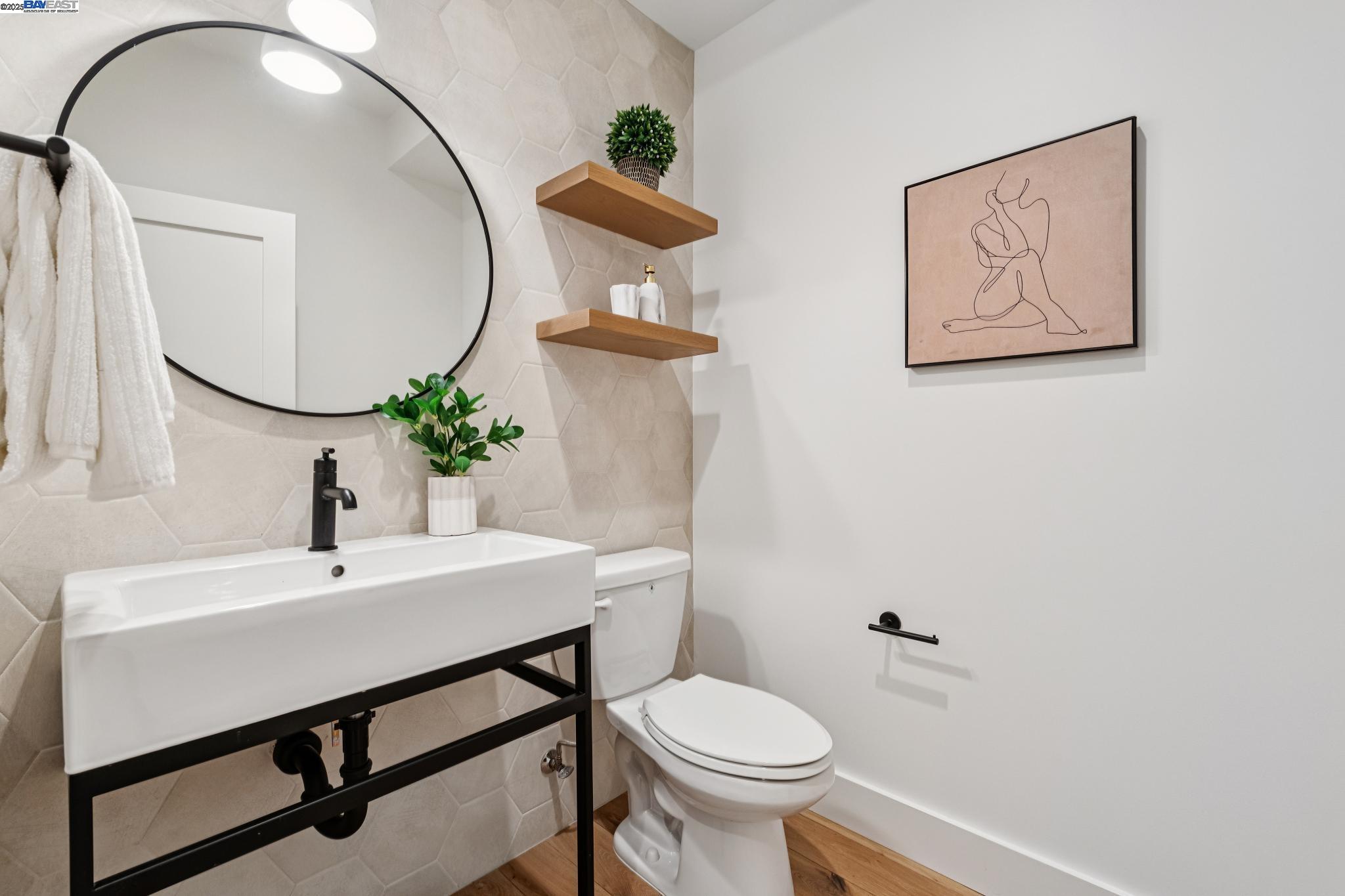 922 Brown Avenue Lafayette, CA 94549 - Photo 18 of 45 a bathroom with a toilet a sink and a mirror