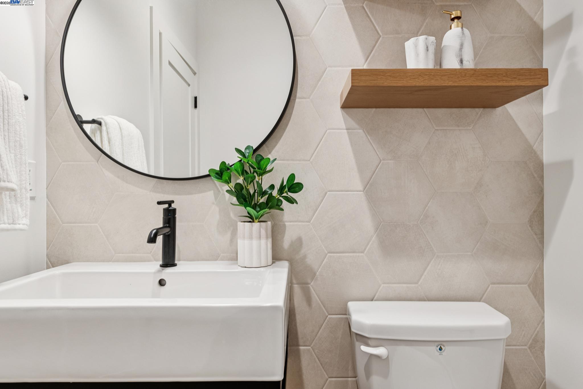 922 Brown Avenue Lafayette, CA 94549 - Photo 19 of 45 a bathroom with a sink and a mirror
