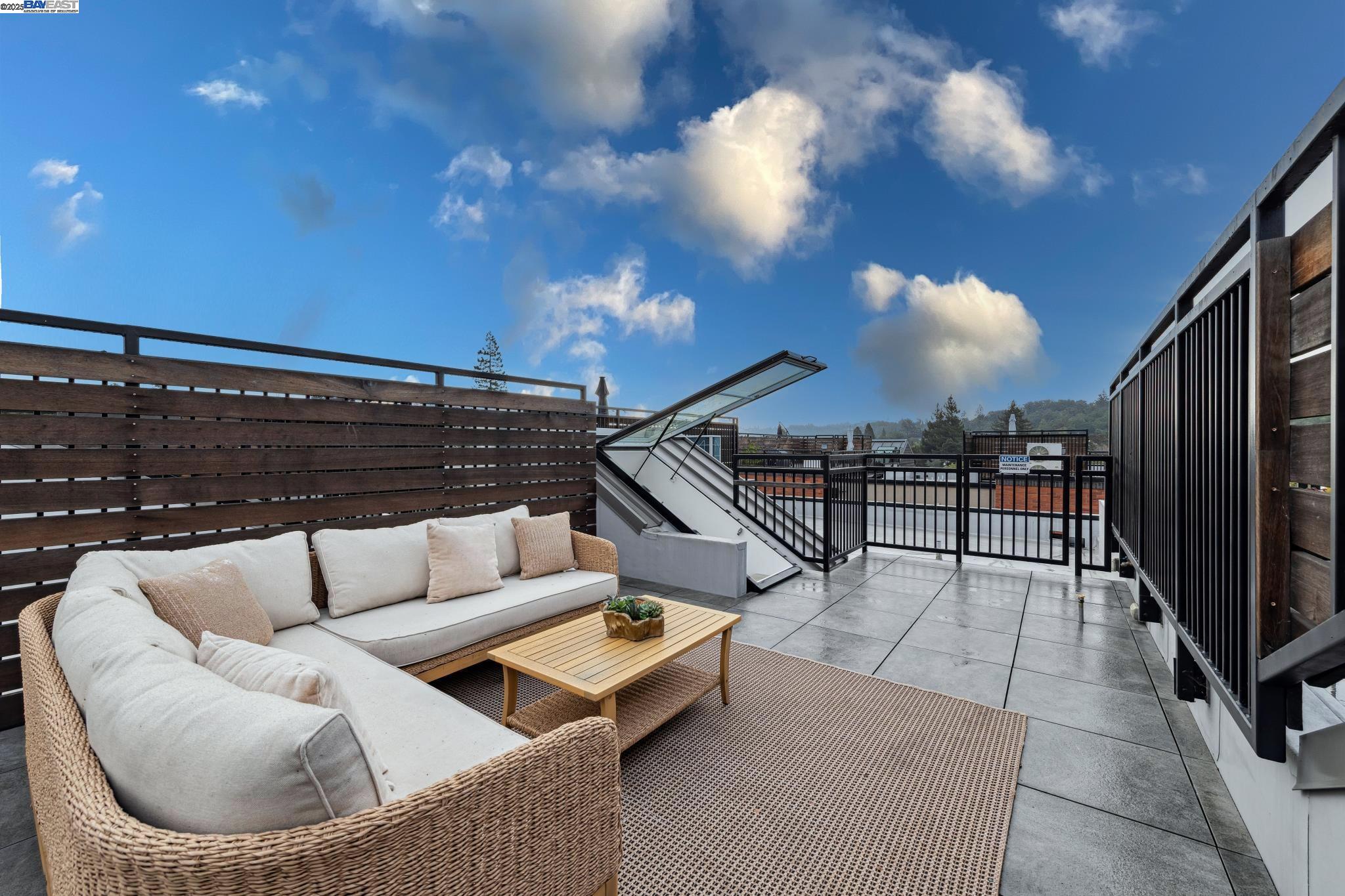 922 Brown Avenue Lafayette, CA 94549 - Photo 36 of 45 a roof deck with couches and potted plants