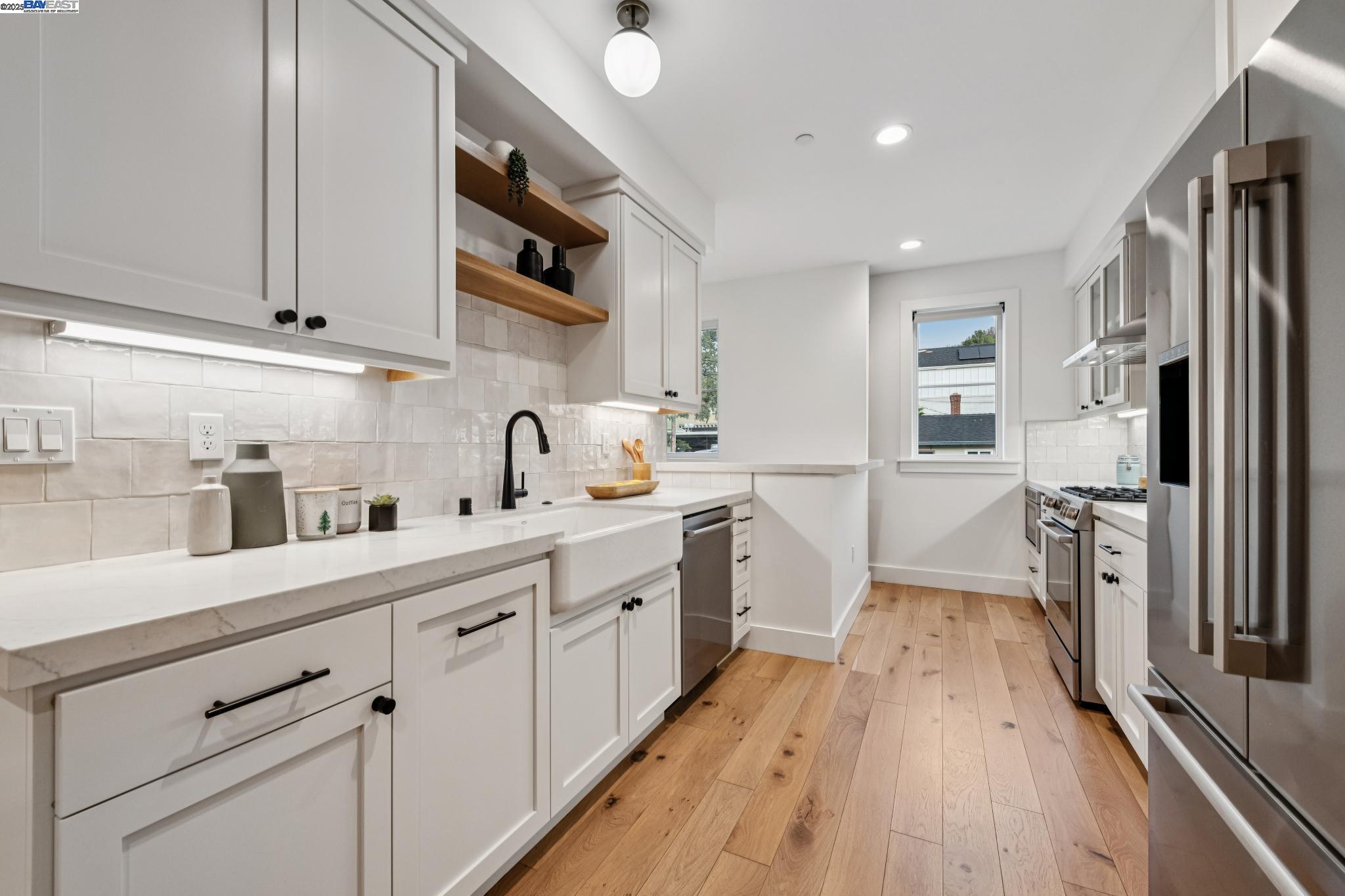 922 Brown Avenue Lafayette, CA 94549 - Photo 8 of 45 a kitchen with cabinets and stainless steel appliances