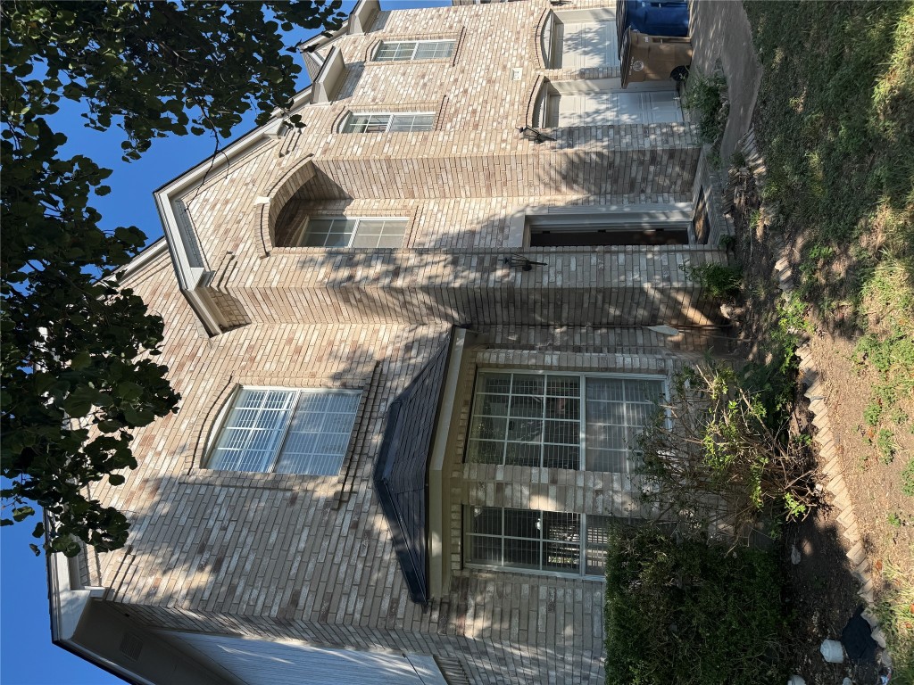 12714 Tantara Drive Austin, TX 78729 - Photo 25 of 25 Traditional-style house featuring brick siding and a garage