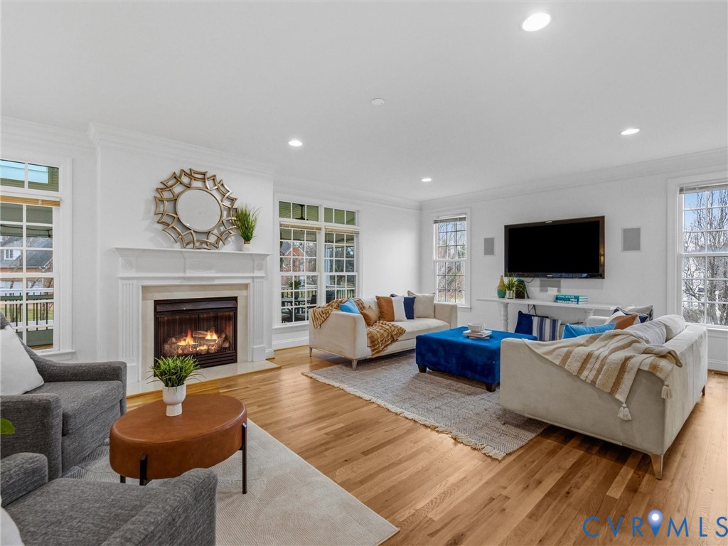 14335 Lander Road Midlothian, VA 23113 - Photo 27 of 70 a living room with furniture and a fireplace