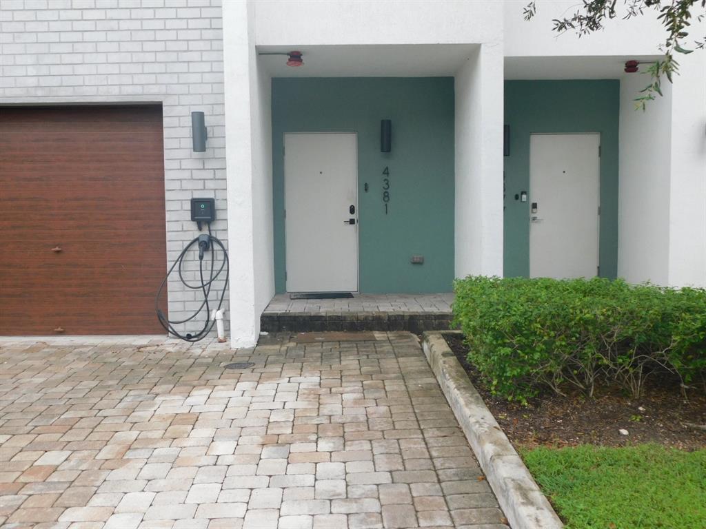 4381 Northwest 9th Street, Unit 4381 Plantation, FL 33317 - Photo 39 of 46 a front view of a house