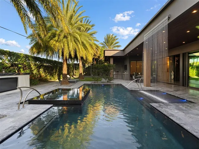 a dining area with furniture and outdoor view