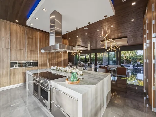 a view of a dining room with furniture and window