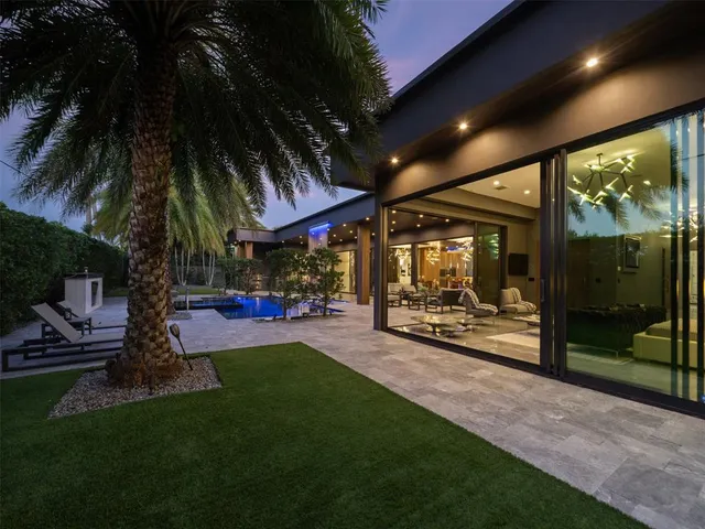 a view of swimming pool with a patio