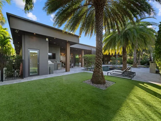 a view of a house with swimming pool