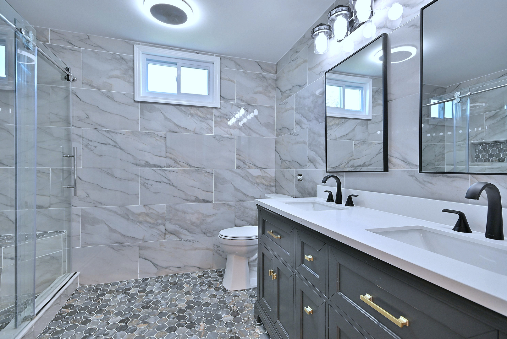 2434 White Barn Road Aurora, IL 60502 - Photo 28 of 45 a bathroom with a sink a toilet and a mirror