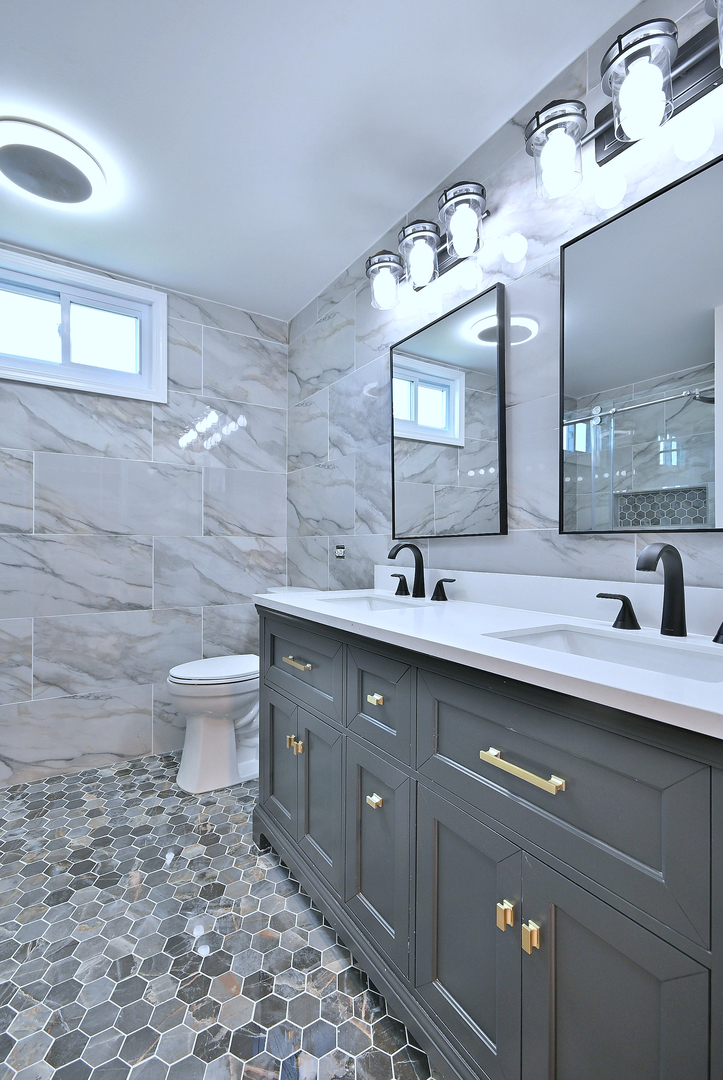 2434 White Barn Road Aurora, IL 60502 - Photo 29 of 45 a bathroom with a double vanity sink mirror and toilet