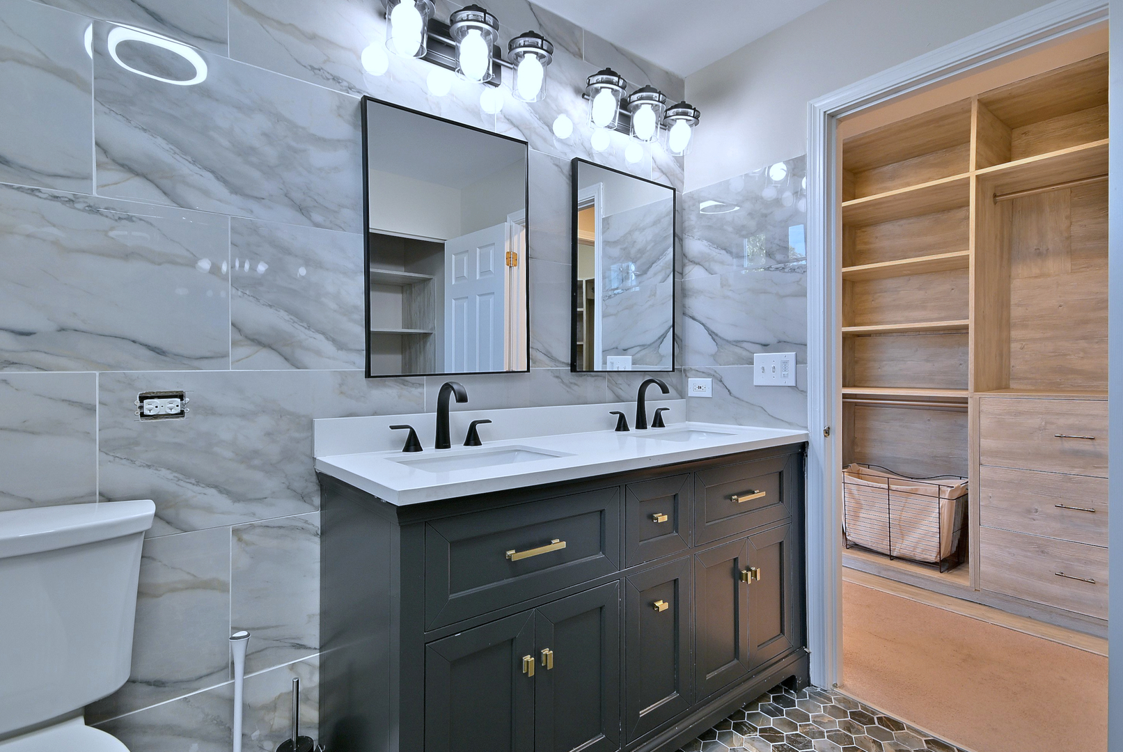 2434 White Barn Road Aurora, IL 60502 - Photo 31 of 45 a bathroom with a sink and a mirror