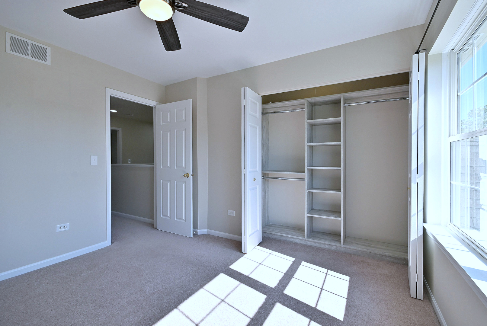 2434 White Barn Road Aurora, IL 60502 - Photo 35 of 45 a view of an empty room and window