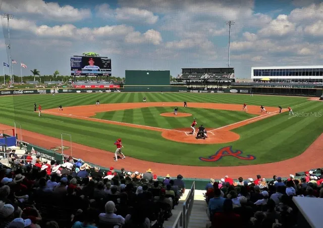 a front view of a house with a garage