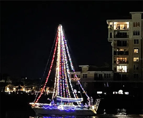 a bedroom with a large bed and a large window