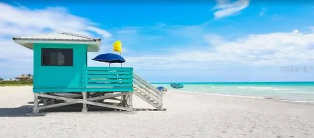 a living room with a couch and a flat screen tv