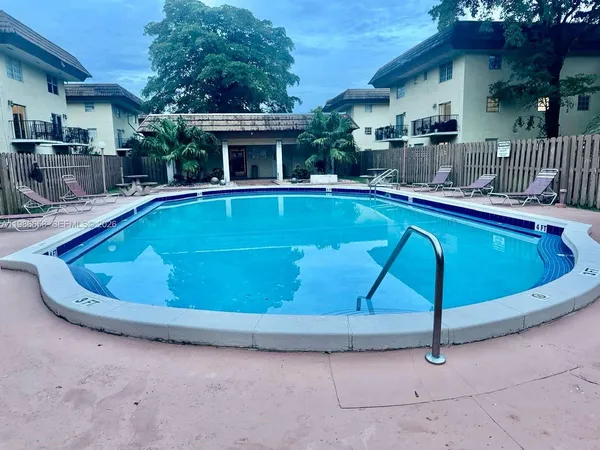 a view of outdoor space yard swimming pool and porch