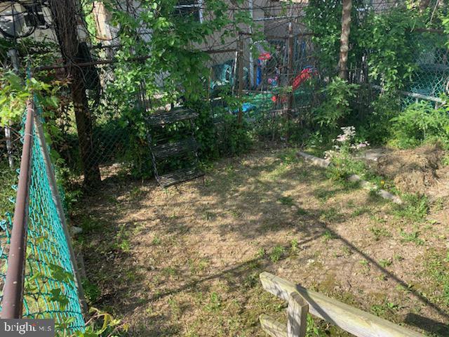 4031 Green Street, Unit A Philadelphia, PA 19104 - Photo 12 of 12 a backyard of a house with lots of green space