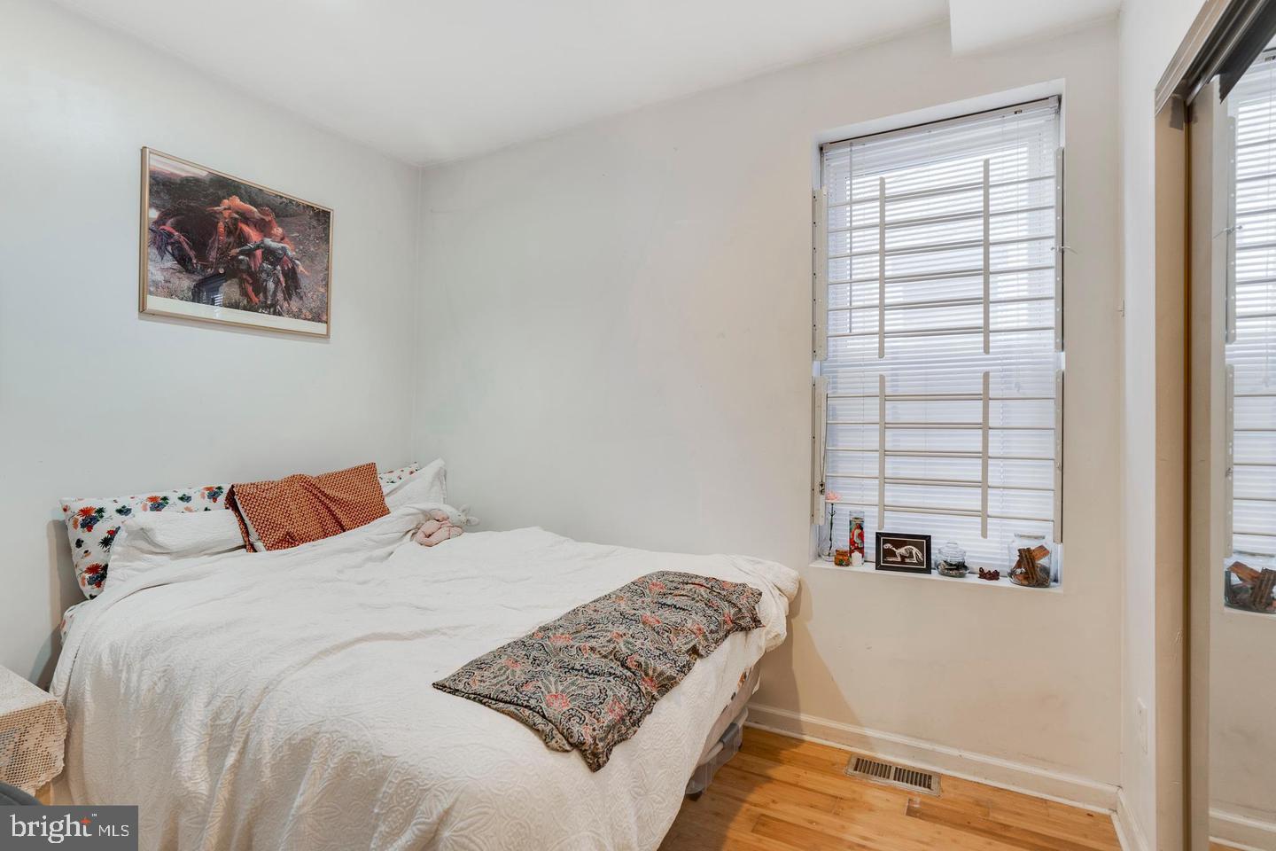 4031 Green Street, Unit A Philadelphia, PA 19104 - Photo 5 of 12 a bedroom with a bed and a window