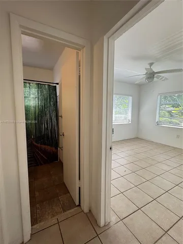 a view of an empty room and window