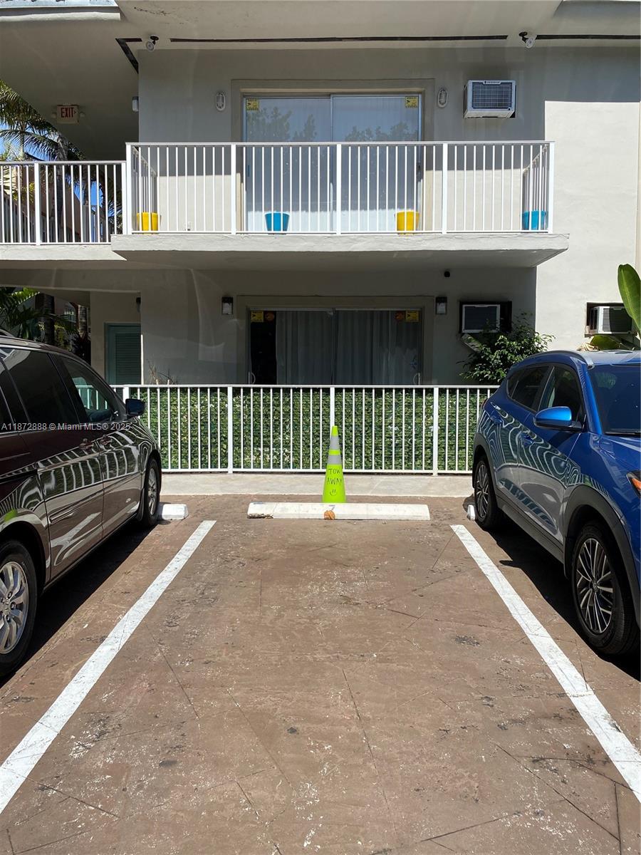 921 Meridian Avenue, Unit 7 Miami Beach, FL 33139 - Photo 30 of 31 a view of a car park in front of house