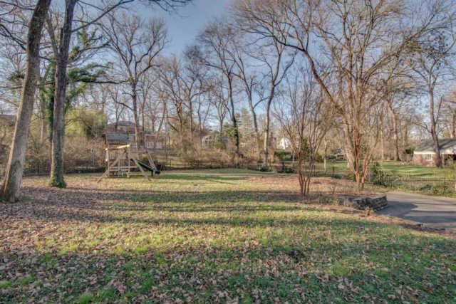 4215 Sneed Road Nashville, TN 37215 - Photo 20 of 20 a backyard of apartments with large trees