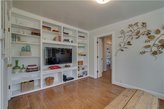 4215 Sneed Road Nashville, TN 37215 - Photo 8 of 20 a living room with furniture and a flat screen tv