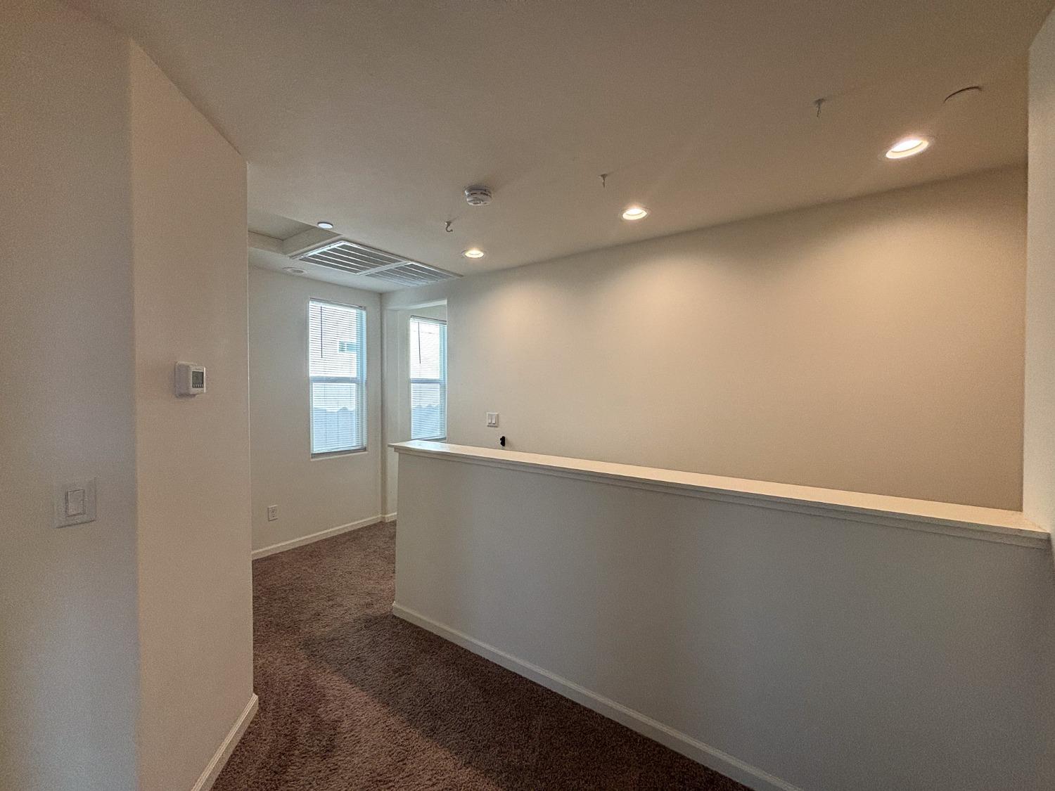 827 Fir Street West Madera, CA 93636 - Photo 24 of 63 an empty room with windows