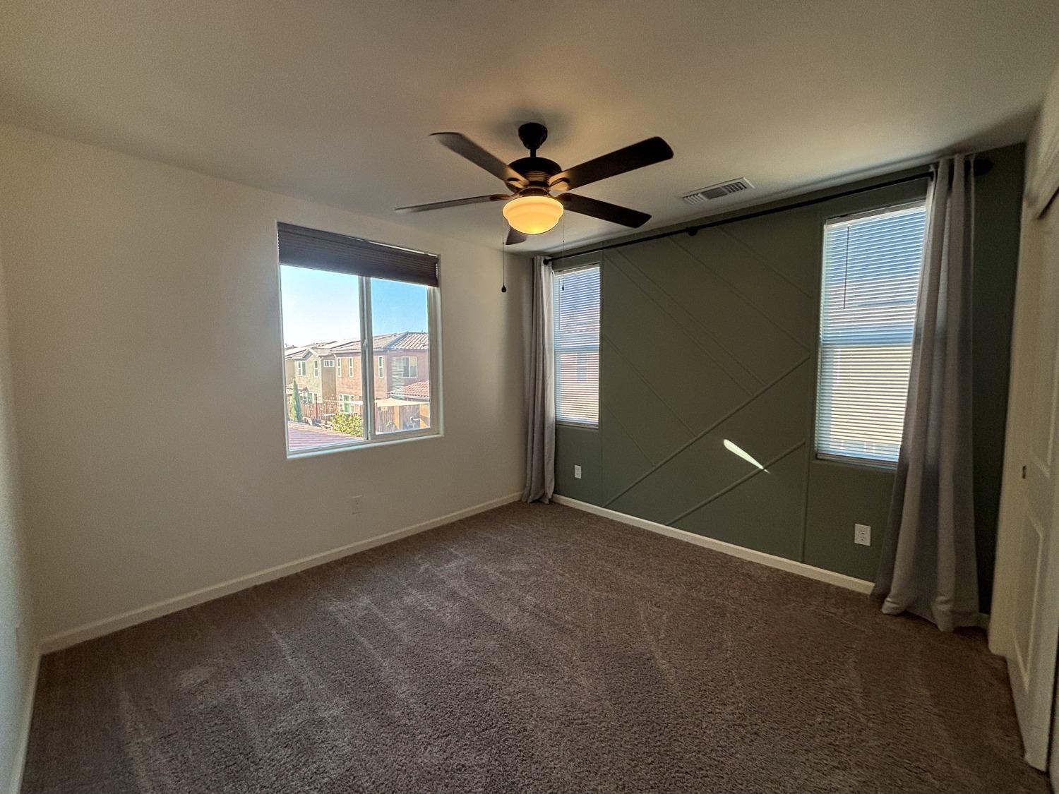 827 Fir Street West Madera, CA 93636 - Photo 31 of 63 a view of an empty room with a window
