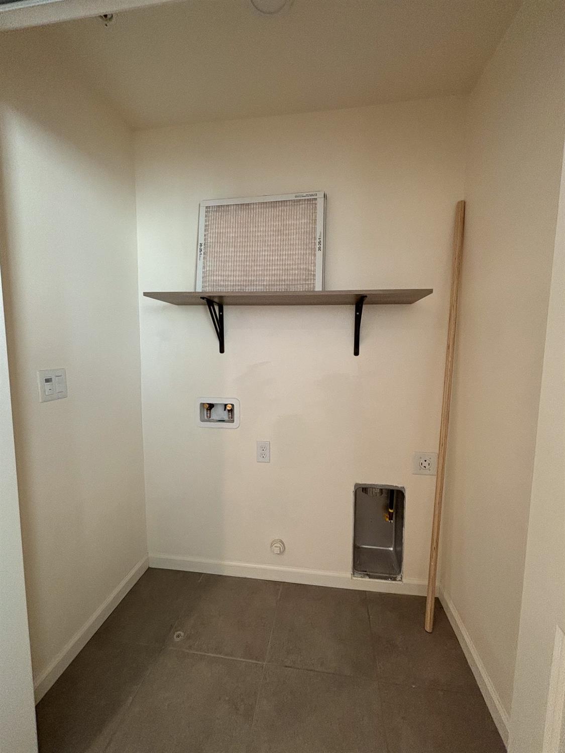827 Fir Street West Madera, CA 93636 - Photo 35 of 63 an empty room with a door