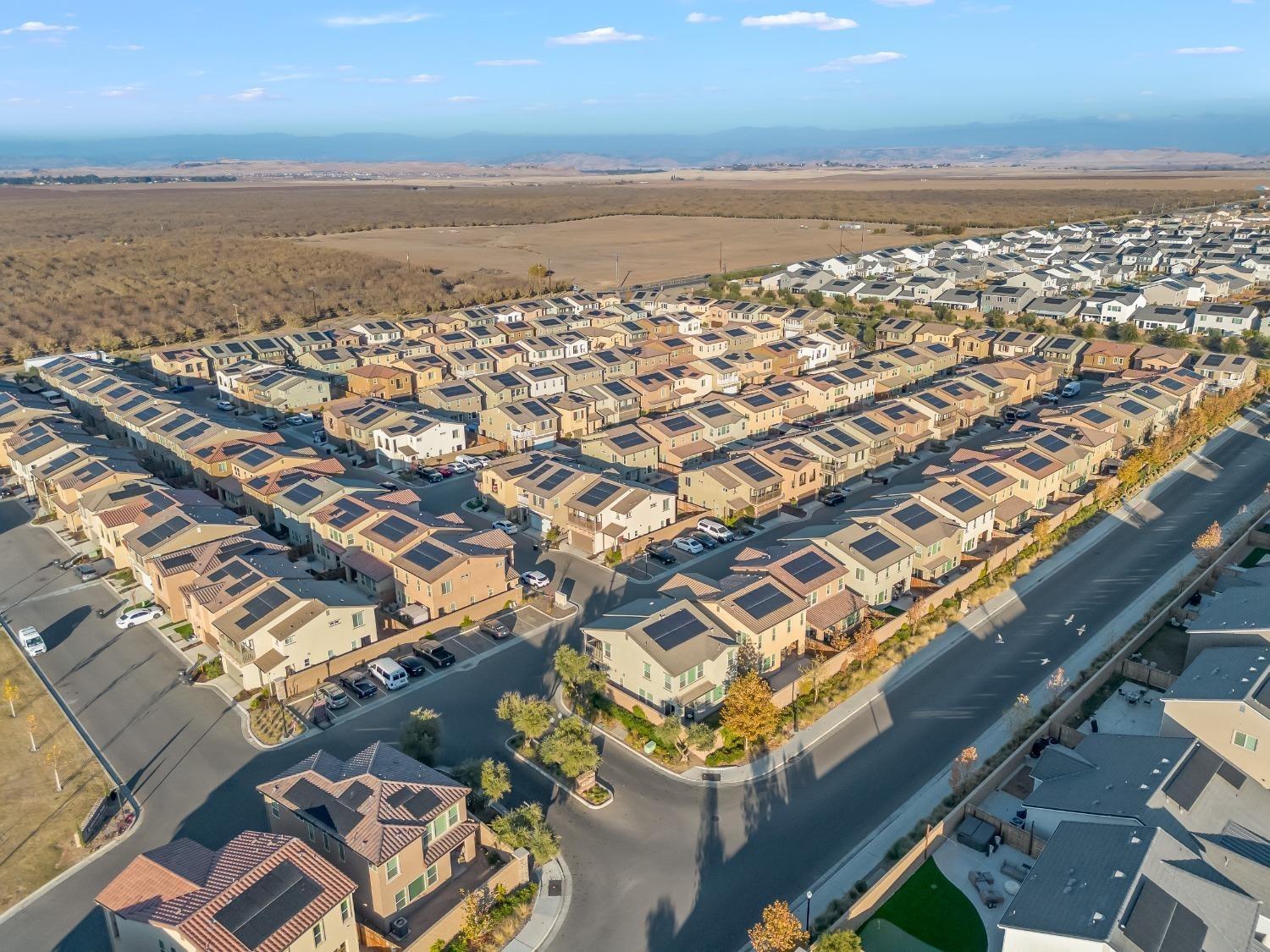827 Fir Street West Madera, CA 93636 - Photo 55 of 63 an aerial view of residential building and ocean