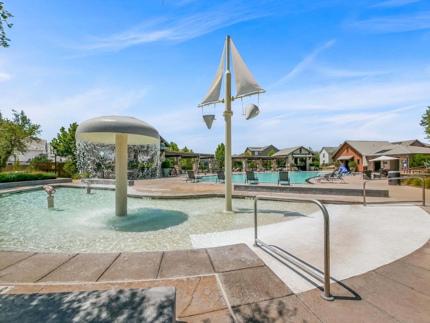 827 Fir Street West Madera, CA 93636 - Photo 60 of 63 a view of a swimming pool with a patio