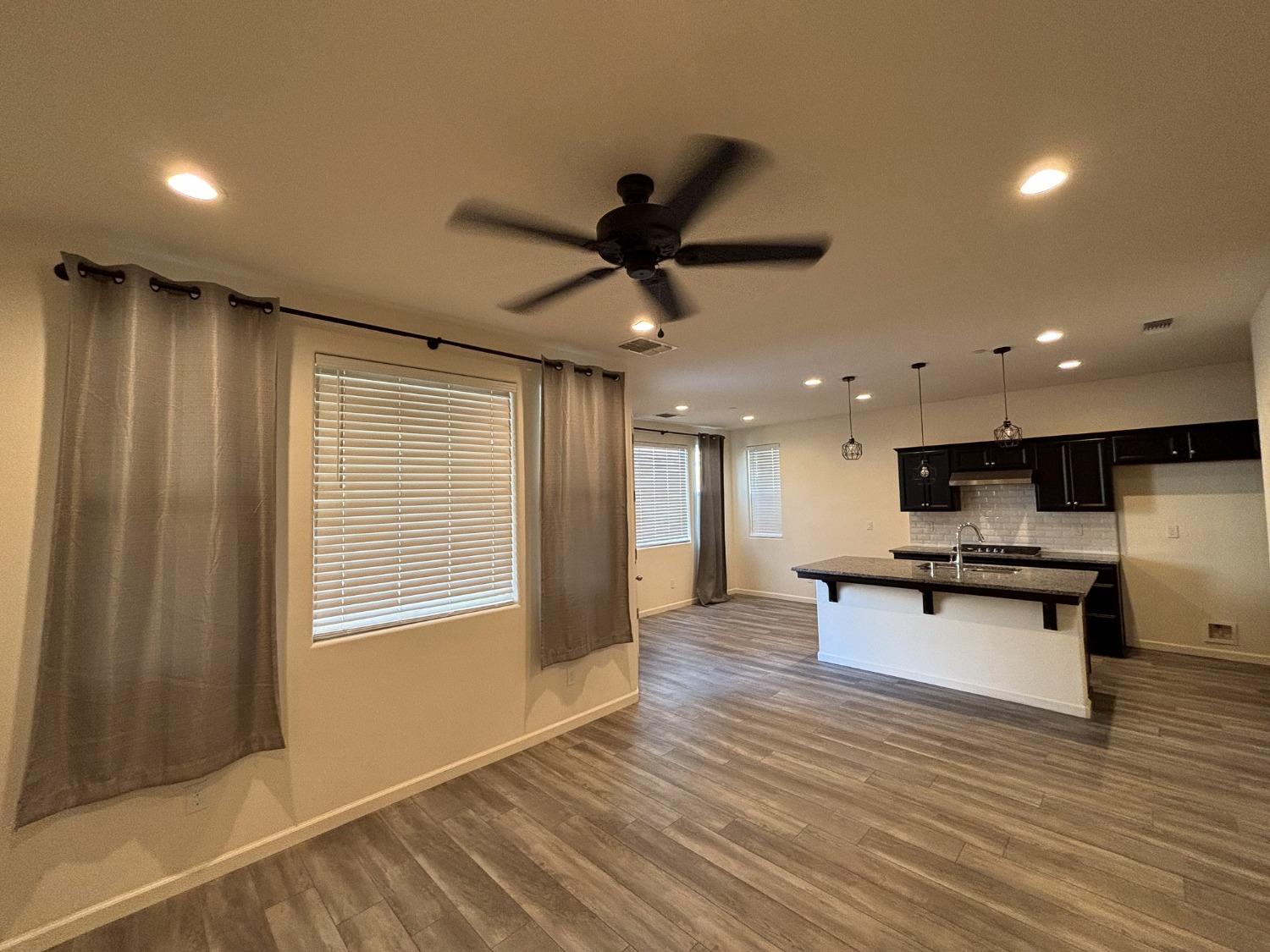 827 Fir Street West Madera, CA 93636 - Photo 9 of 63 a view of a kitchen with a sink and a window
