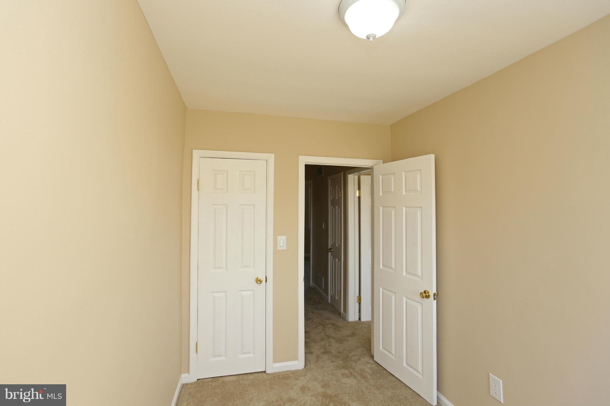 4440 Fenor Road Baltimore, MD 21227 - Photo 14 of 30 a view of a room with a wardrobe space