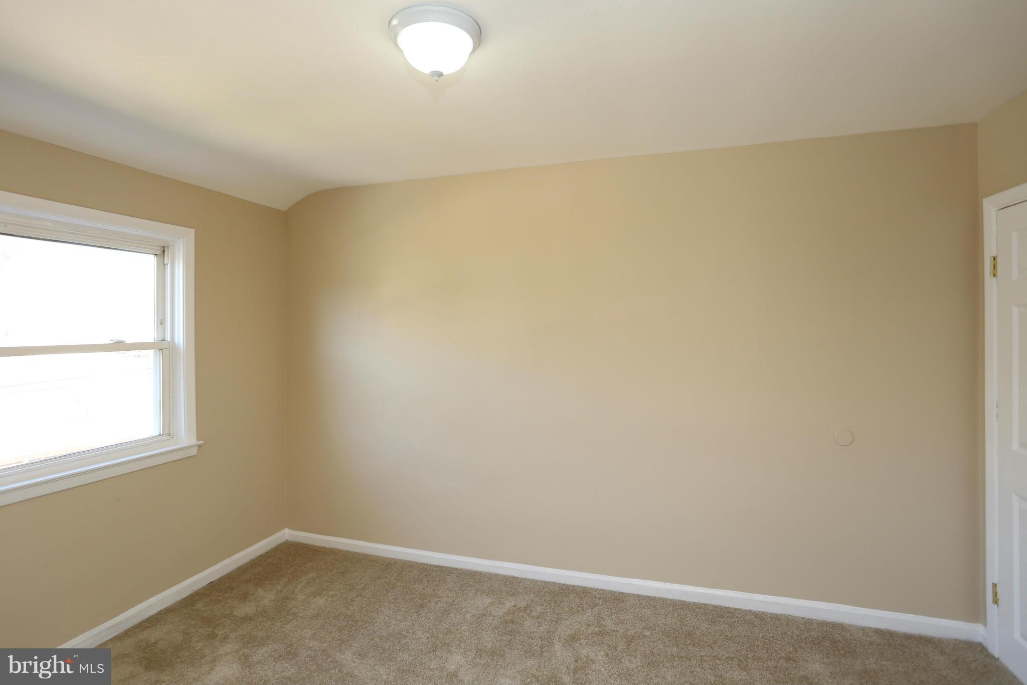 4440 Fenor Road Baltimore, MD 21227 - Photo 17 of 30 an empty room with a window