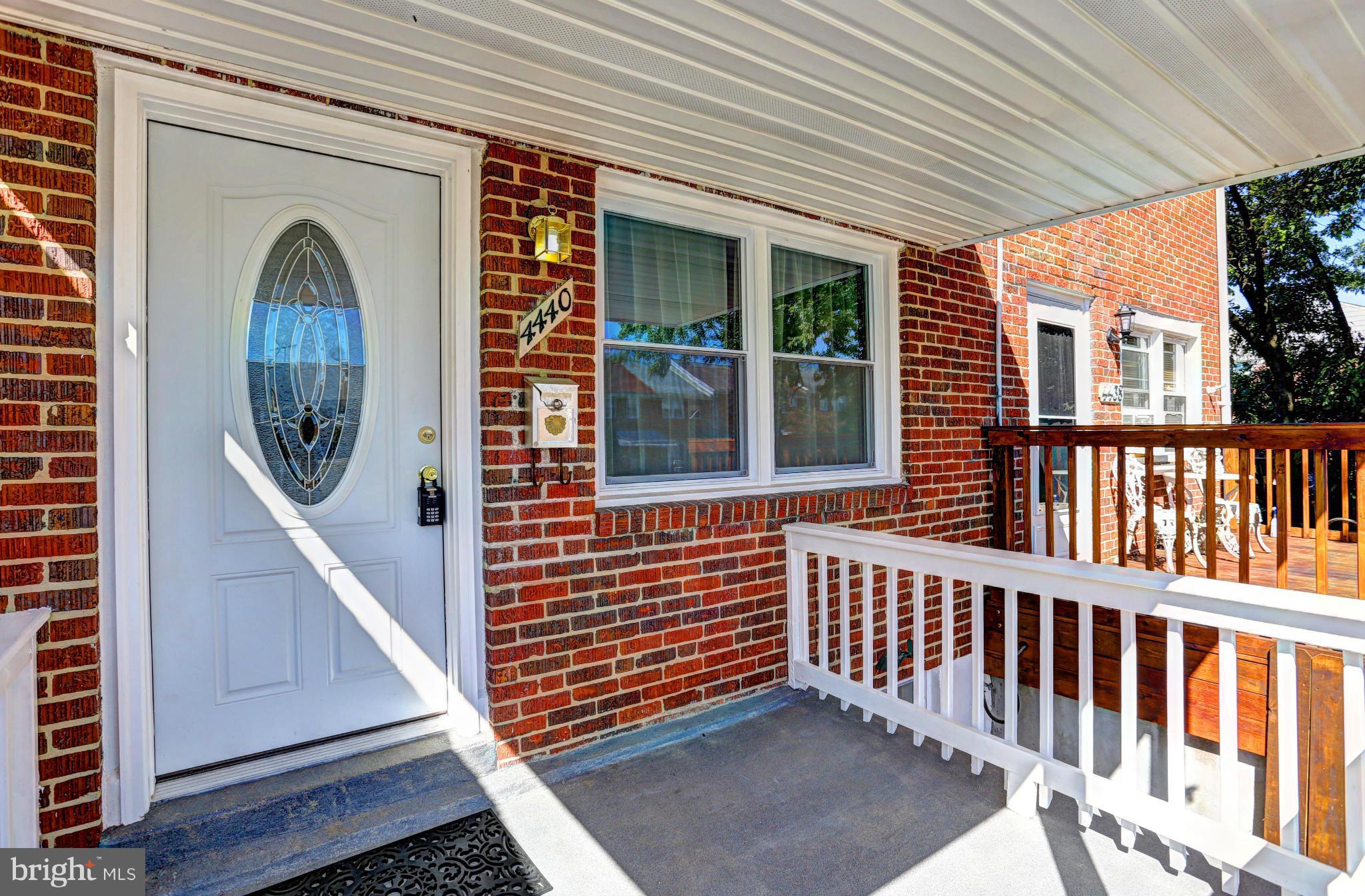 4440 Fenor Road Baltimore, MD 21227 - Photo 3 of 30 a view of a porch with a door