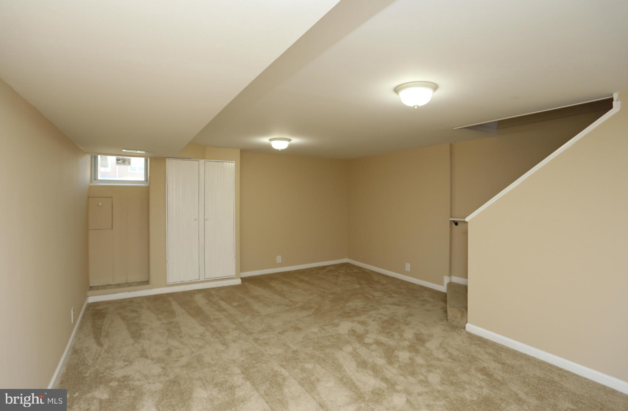 4440 Fenor Road Baltimore, MD 21227 - Photo 23 of 30 an empty room with windows